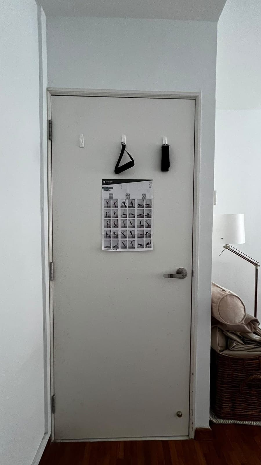 A white bedroom door in Bedok before wrapping