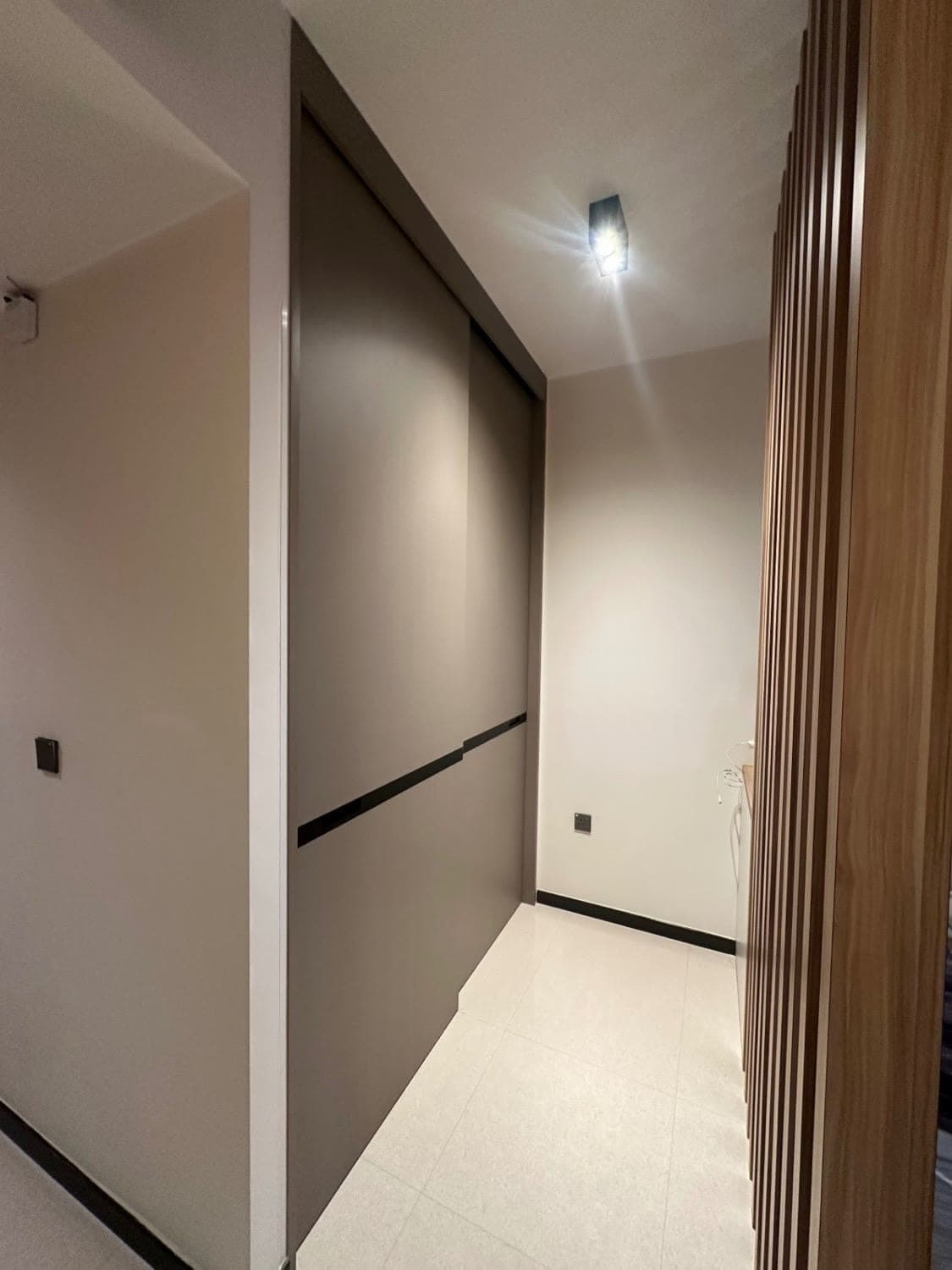 A wall of built-in doors before wrapping