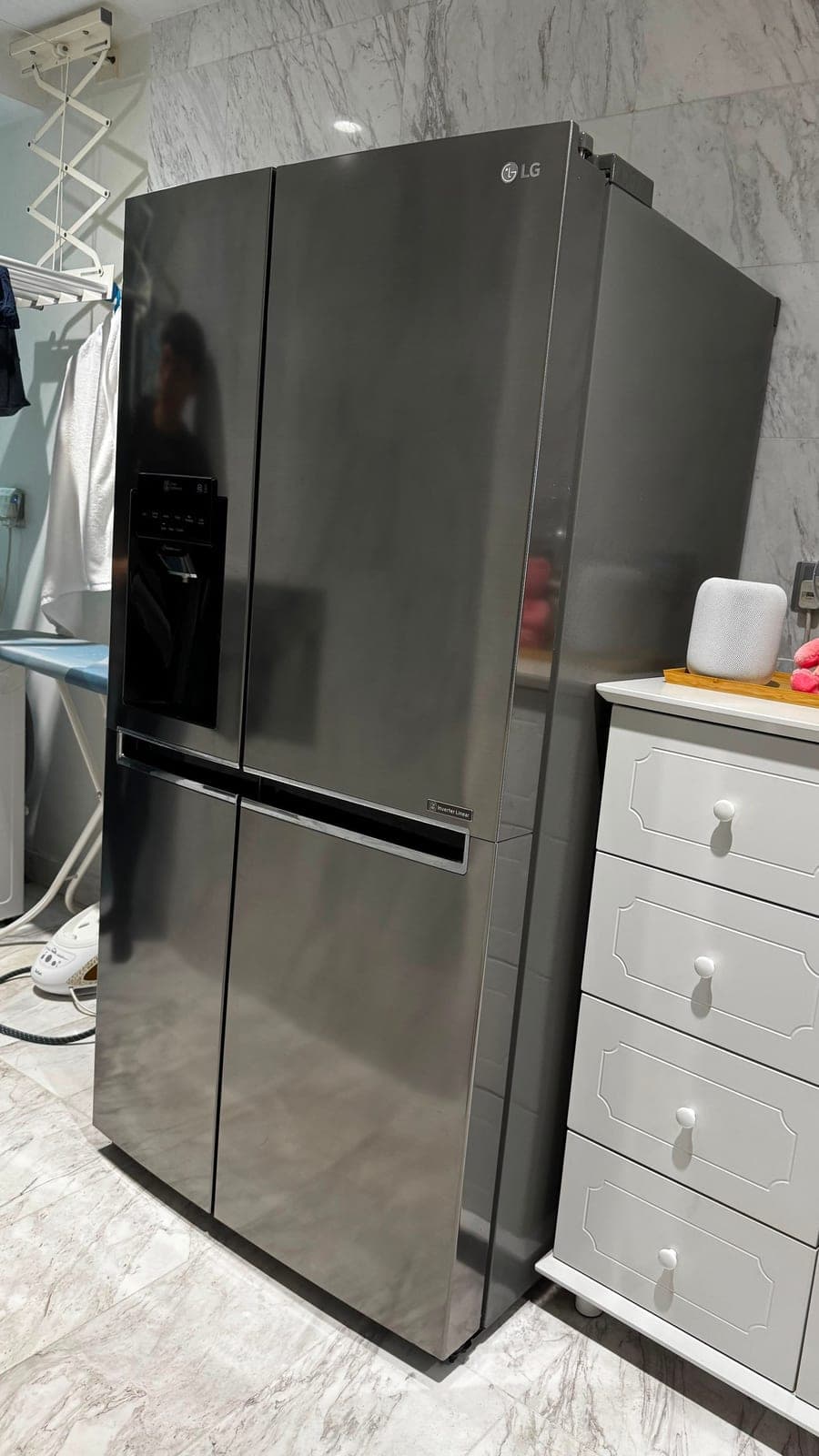 A dark steel side-by-side fridge in Keppel Bay before wrapping
