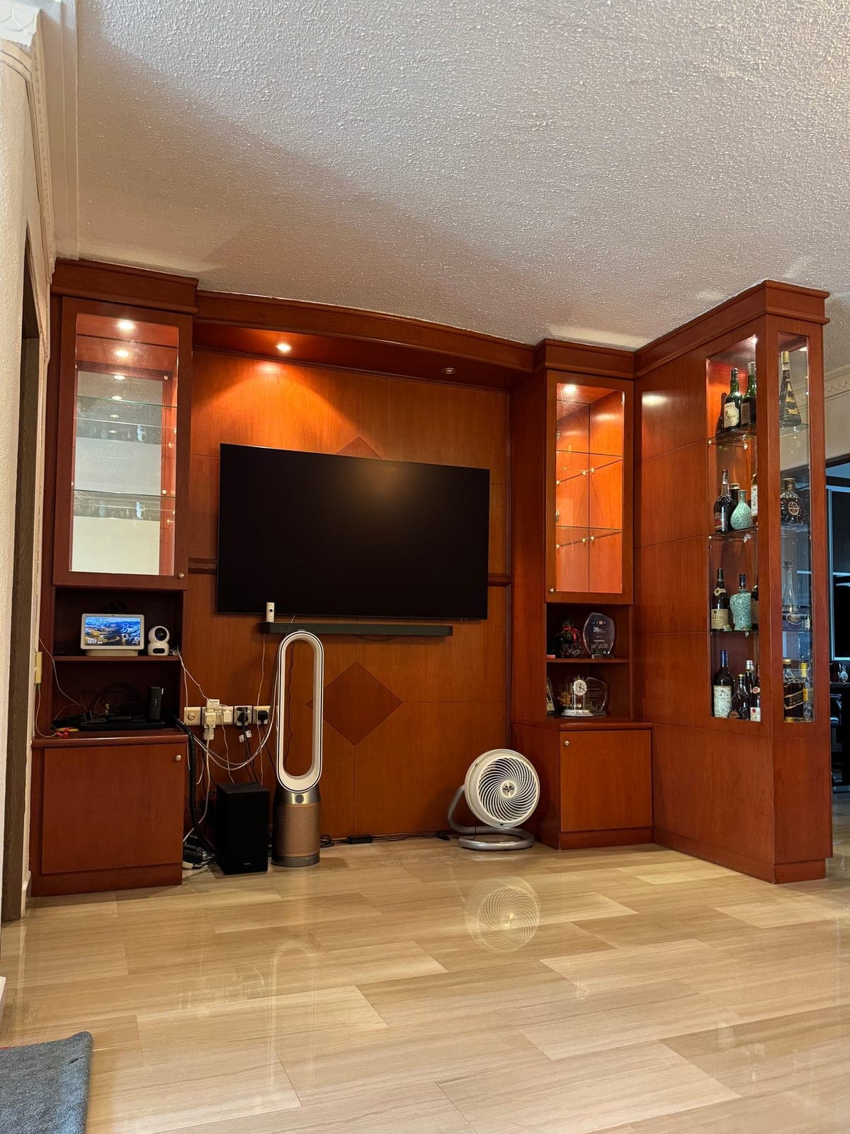 A cherry wood TV wall and display cabinet in Bukit Merah before wrapping